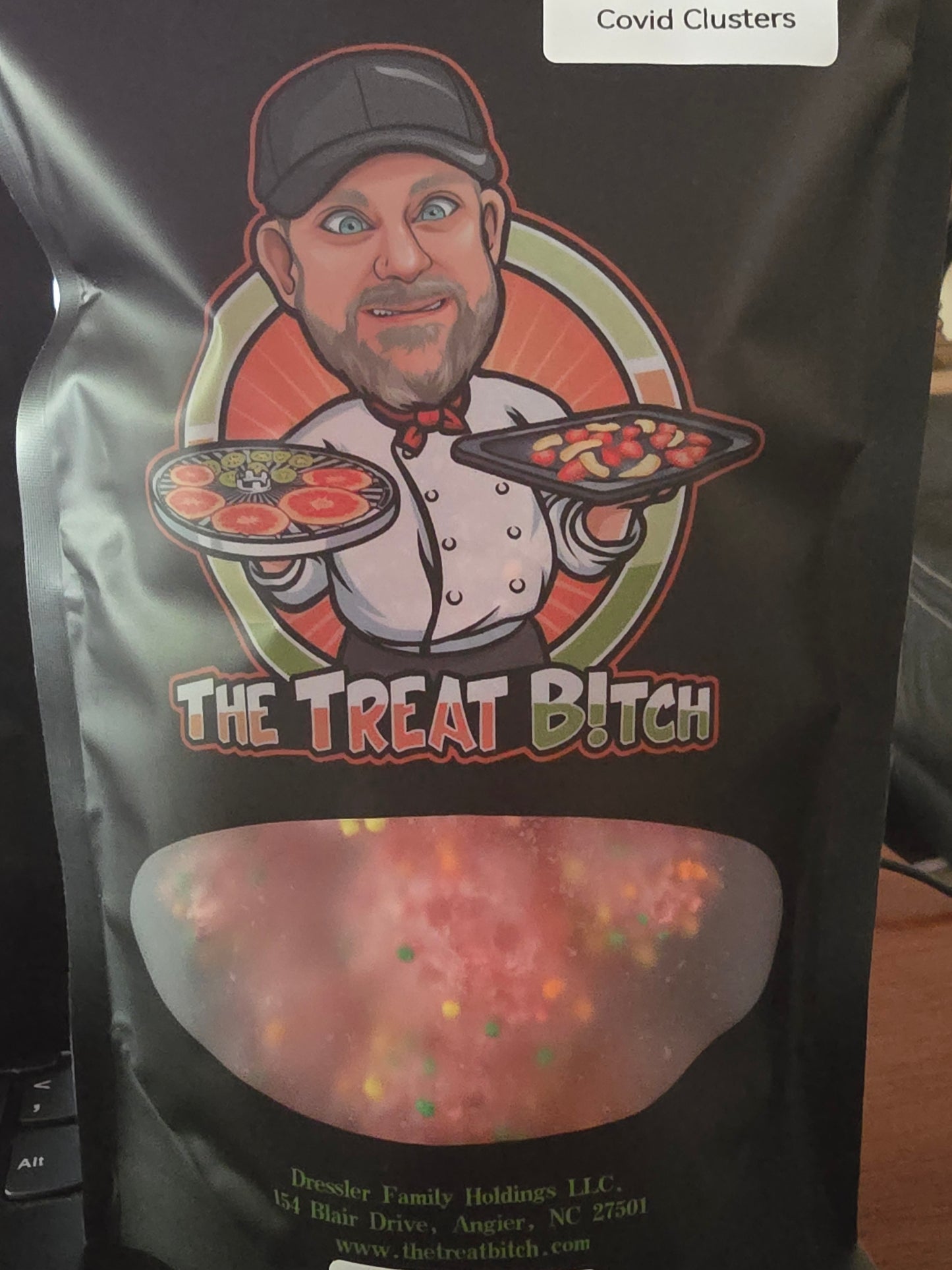 Open pouch of Covid Clusters showcasing sweet, airy, shockingly fun treats.