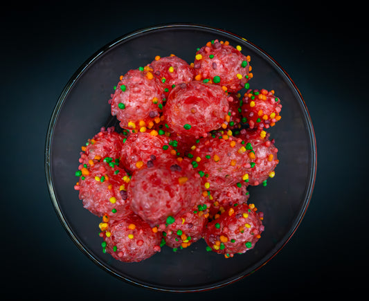 Vibrant Covid Clusters candy packaging with electric burst design.